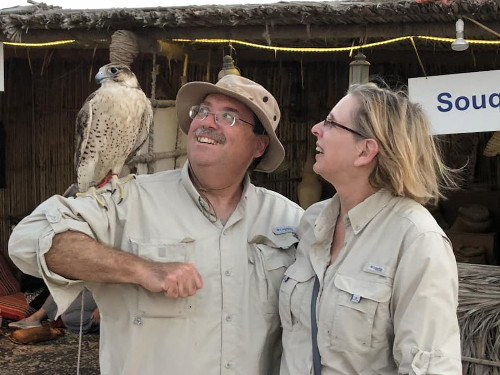 Leslie and I with a falcon on my shoulder.