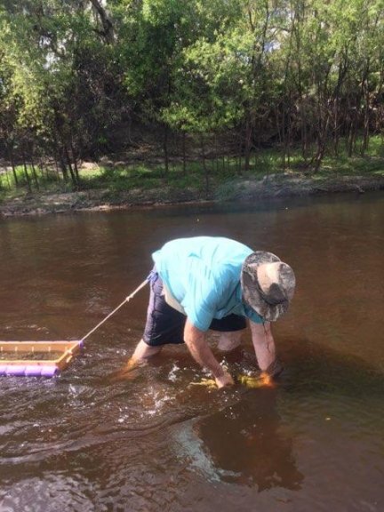 Me out in the middle of the river digging.