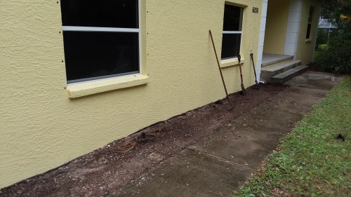 Digging out the front planter.