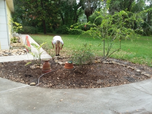 Leslie working on the planter.