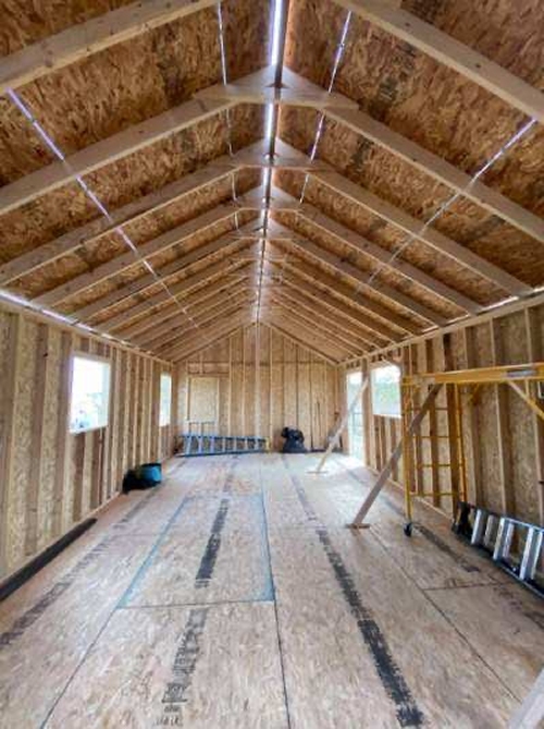 The walls and roof roughed in.