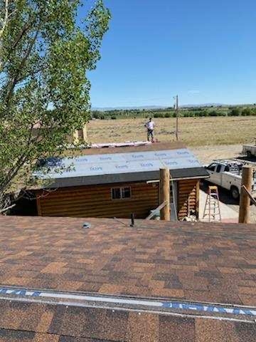 New roofs on two buildings.