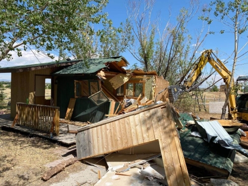 Demolishing the old studio building.