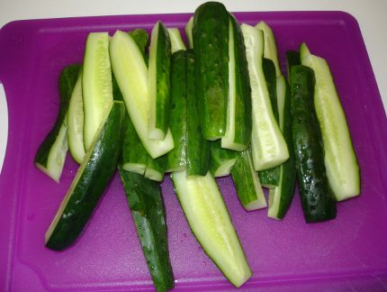 A pile of sliced cucumbers.