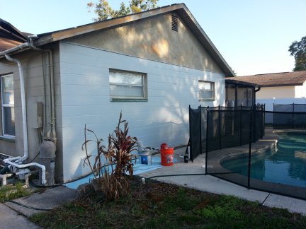 Painting the exterior of the house.