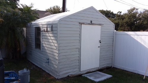 The old shed in the back yard has been painted.