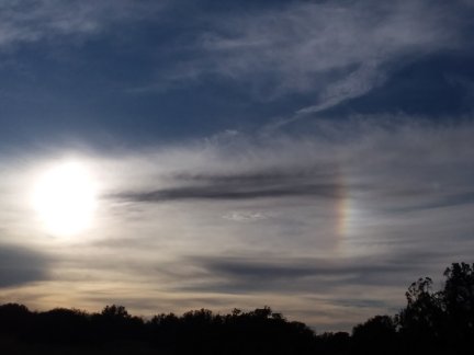 A bright rainbow sundog.