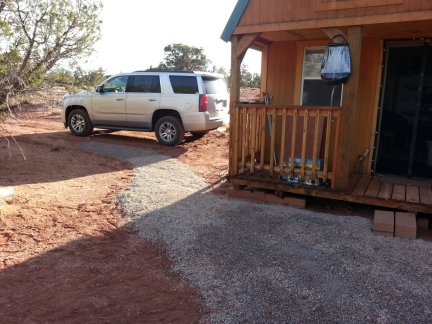 The stone walk around the cabin.